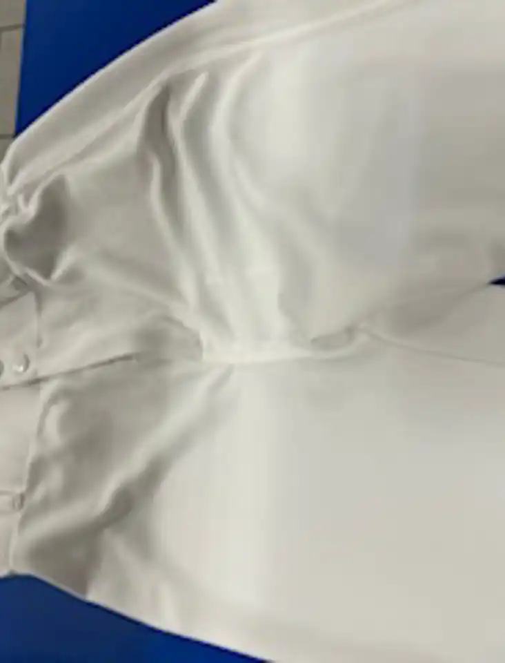 baseball pants cleaned to perfection by Reload Laundry